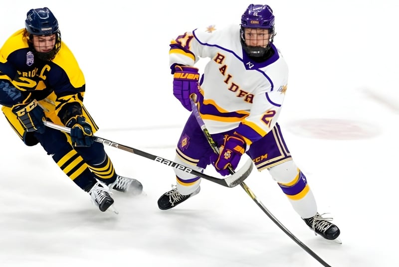 Dos jugadores de hockey completamente equipados juegan en el campo de hielo de Luther College High School.